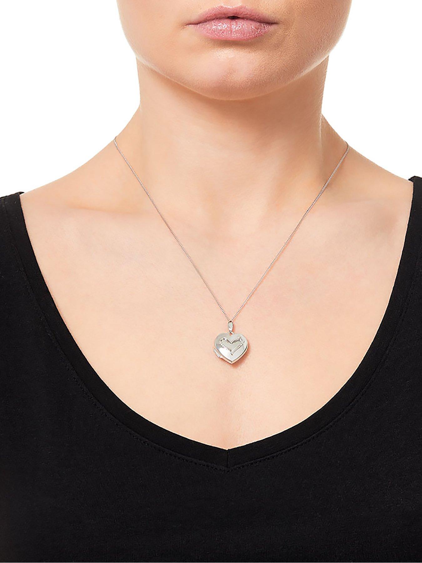 Image 3 of 5 of Beaverbrooks 9ct White Gold Diamond Heart Locket