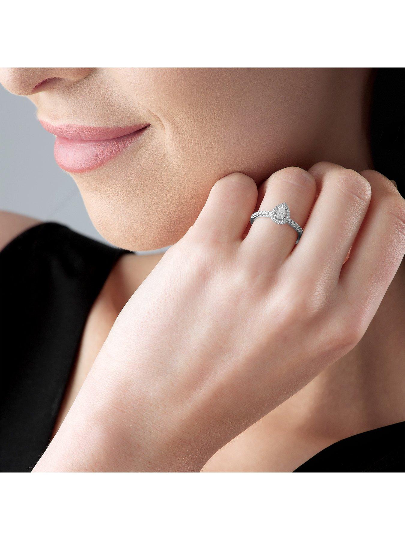 Image 4 of 7 of Beaverbrooks 18ct White Gold Diamond Pear Shaped Halo Ring