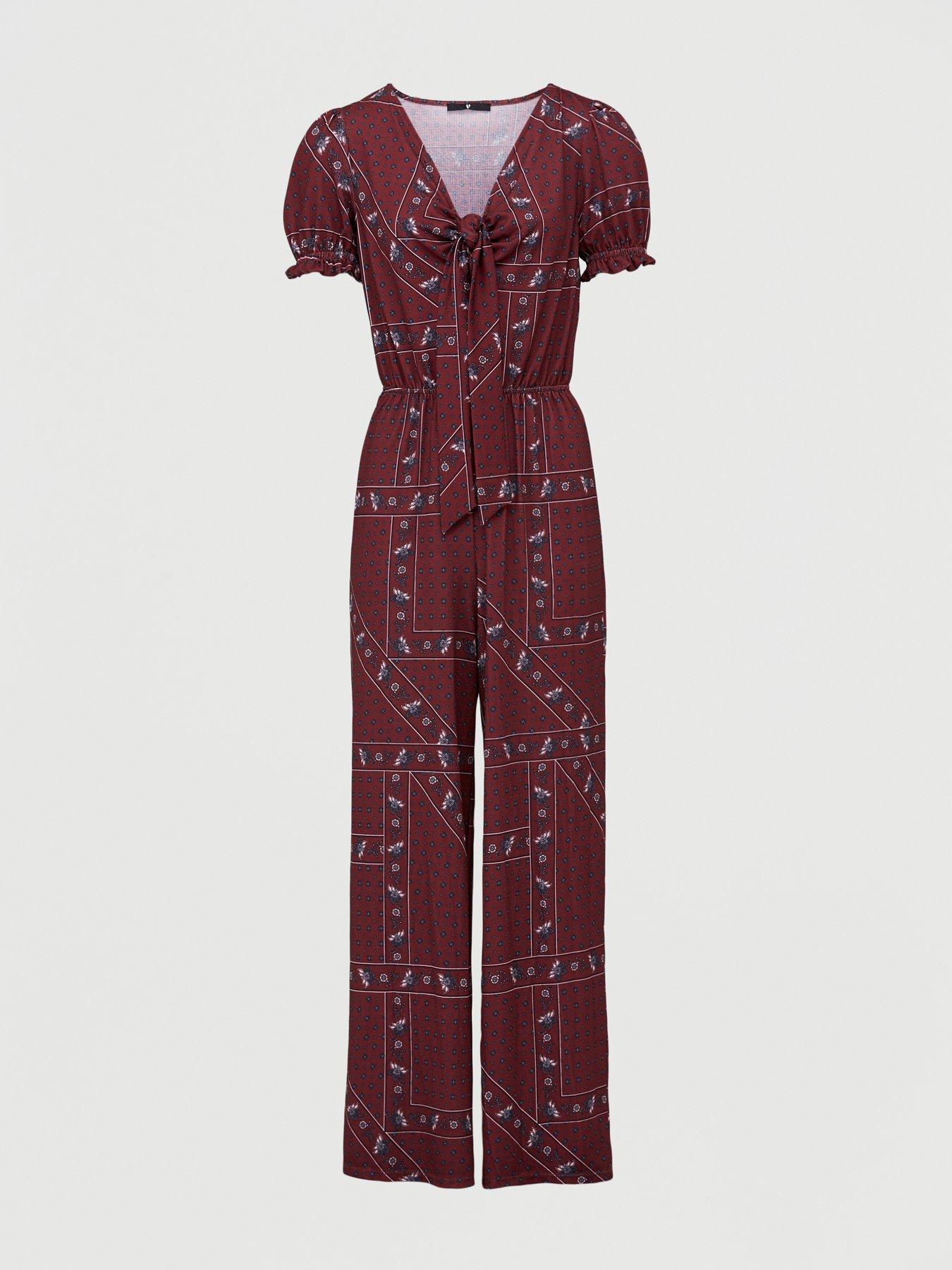 navy floral high neck print jumpsuit with tie front