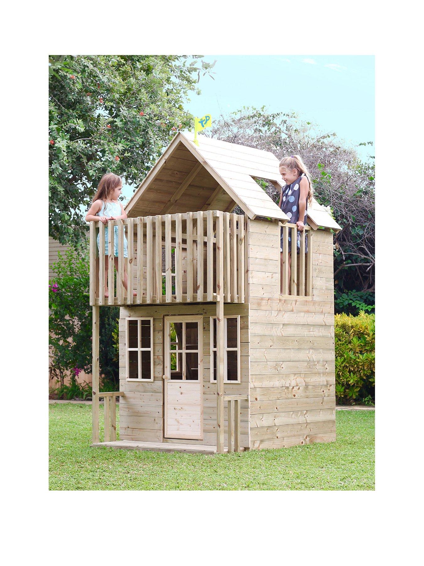 wooden playhouse with loft