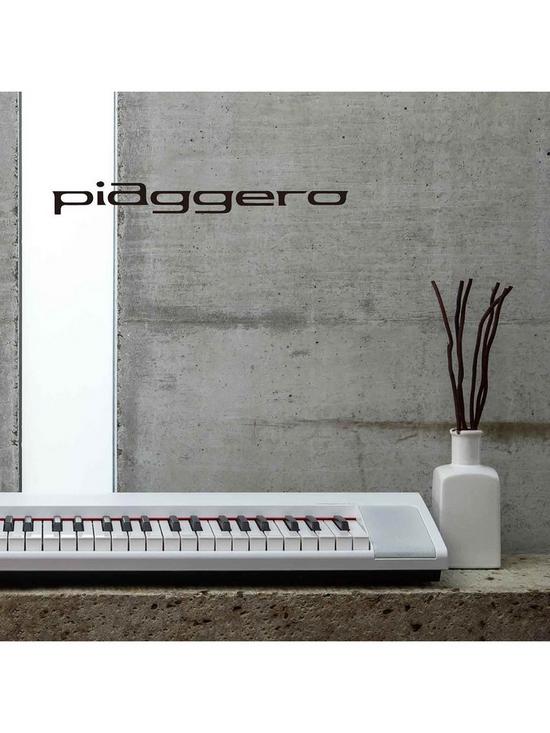 back image of yamaha-piaggero-np12-white-electronic-keyboard-with-stand-bench-headphones-and-online-lessons