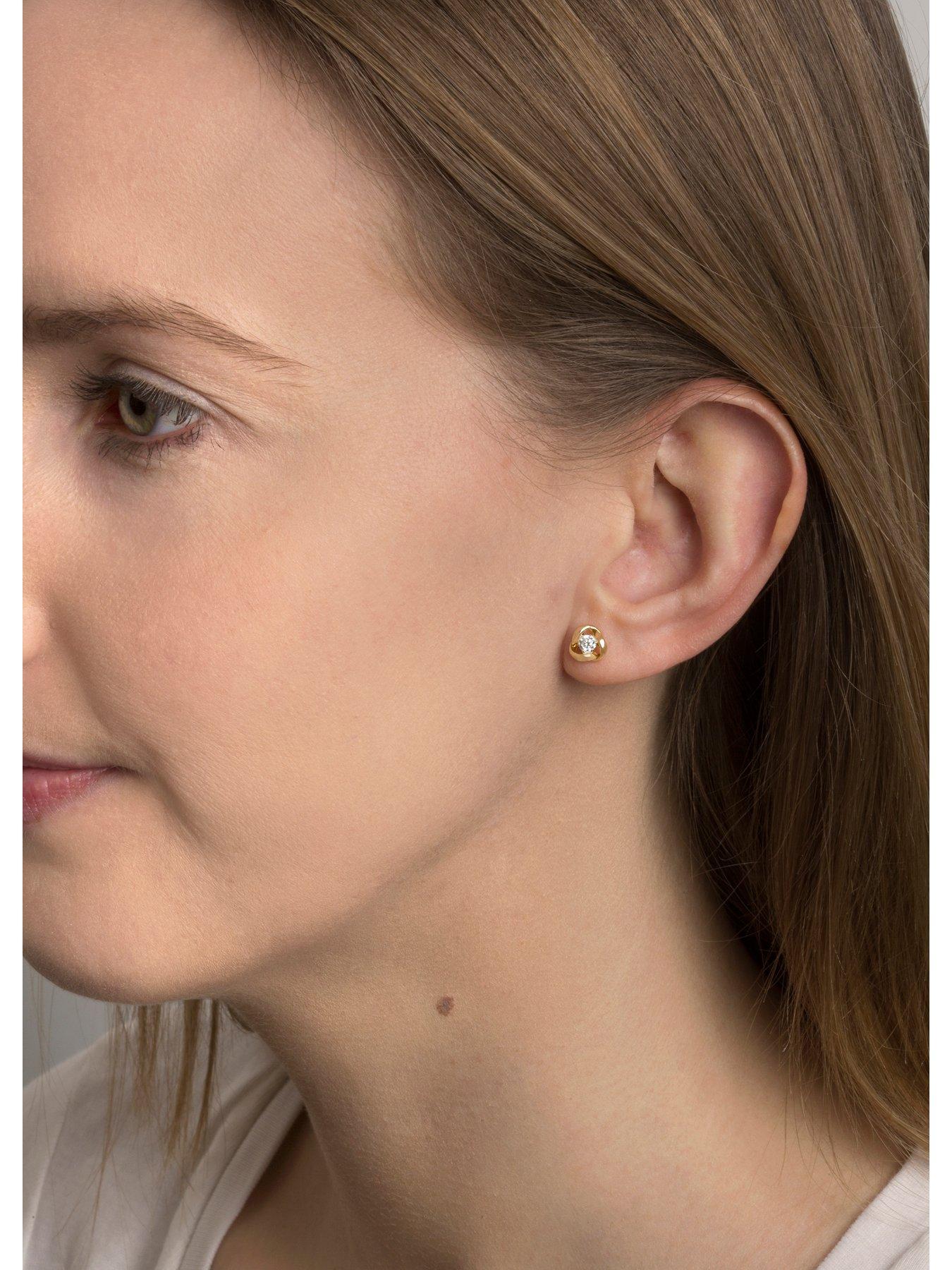 Image 2 of 4 of The Love Collection 9ct Gold 6.5mm three-way knot studs with 3mm Cubic Zirconia