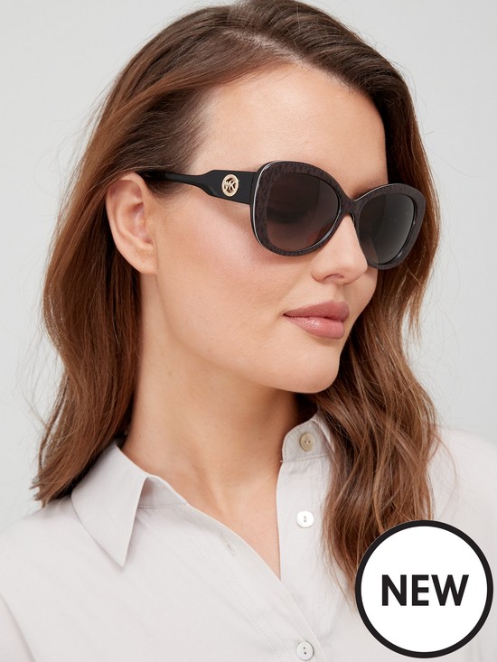 front image of michael-kors-oval-sunglasses-dark-brown-mk-jacquard-logo