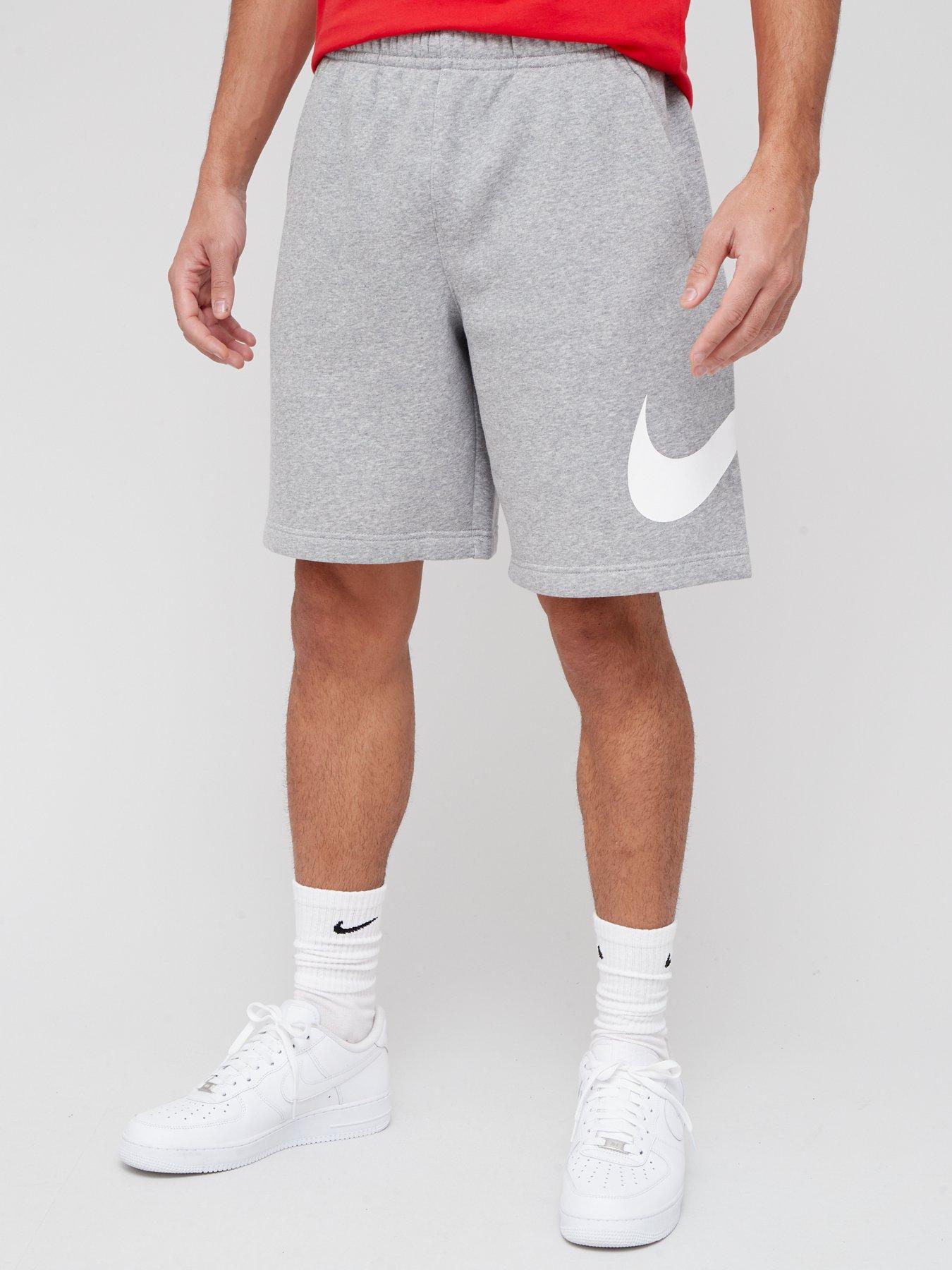 grey and white nike shorts