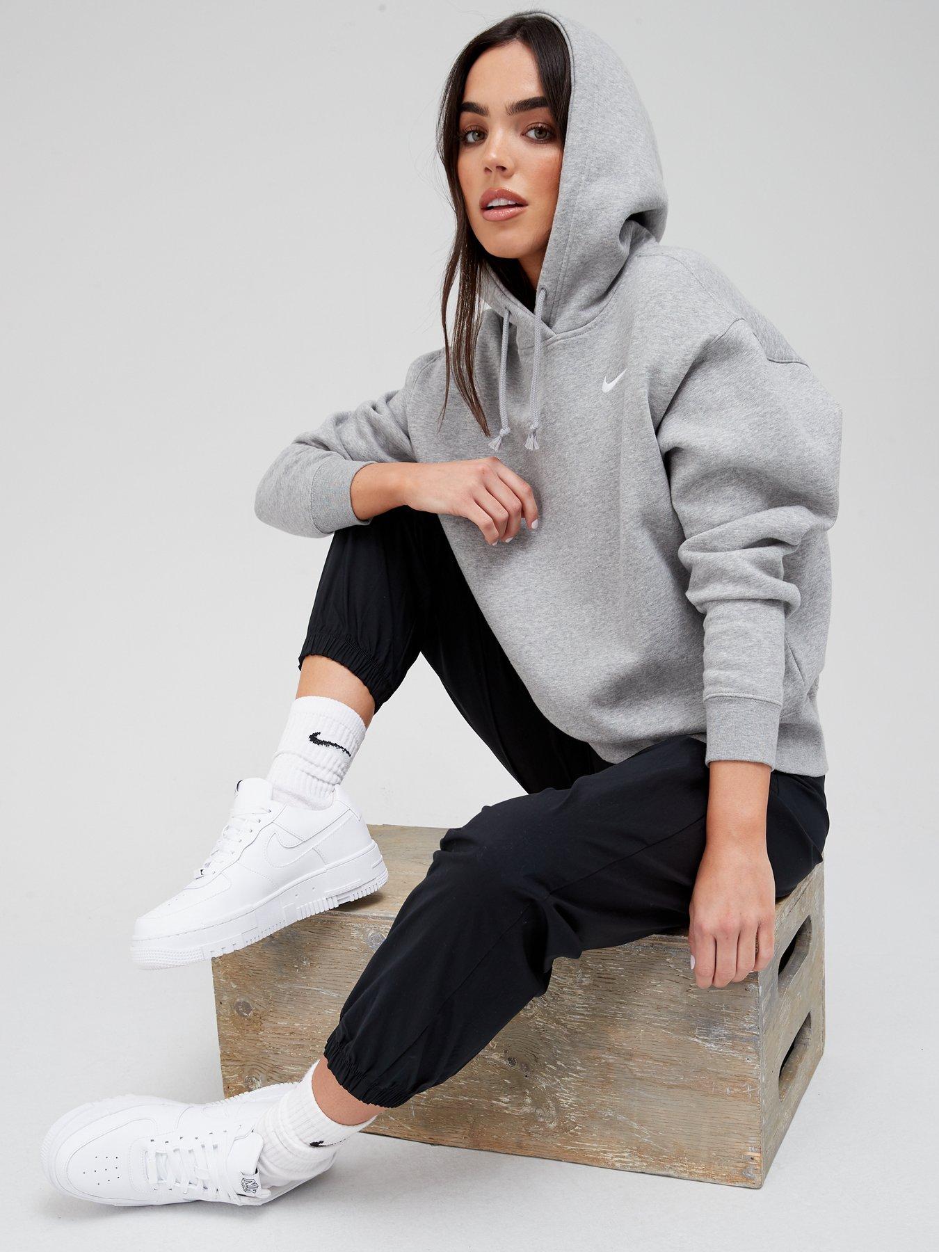 womans grey nike jumper