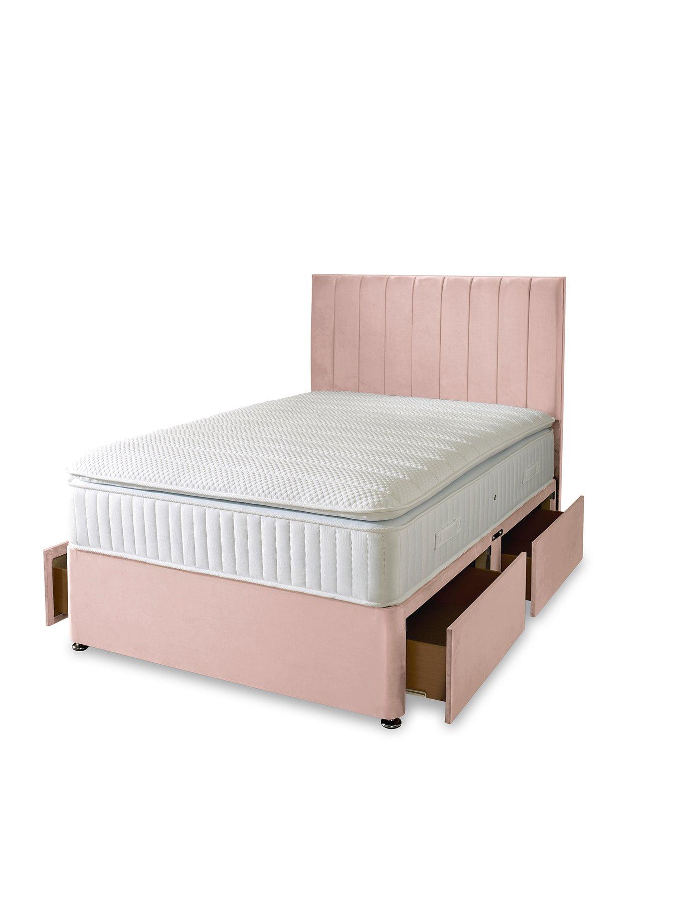 pink single divan bed with storage