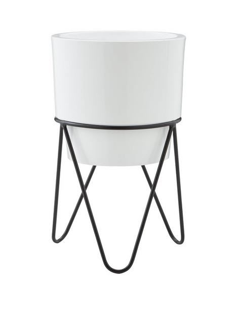 white-planter-with-black-metal-stand