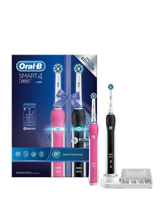 front image of oral-b-smart-4900-electric-rechargeable-toothbrush-duo-pack