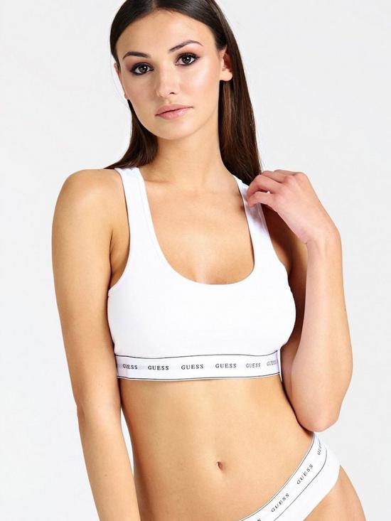 front image of guess-racerback-logo-bralette-white