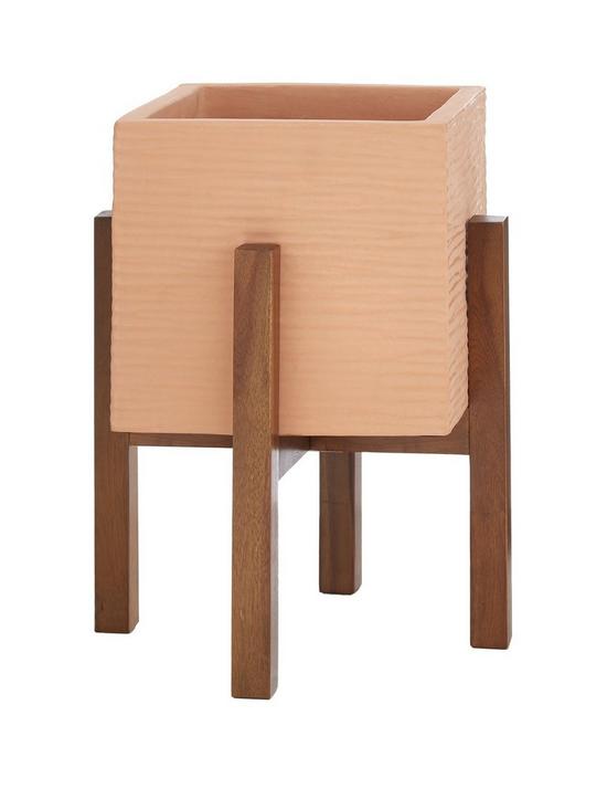 front image of square-planter-on-wooden-legs-sand
