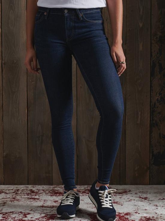 front image of superdry-mid-rise-skinny-jeans-denim