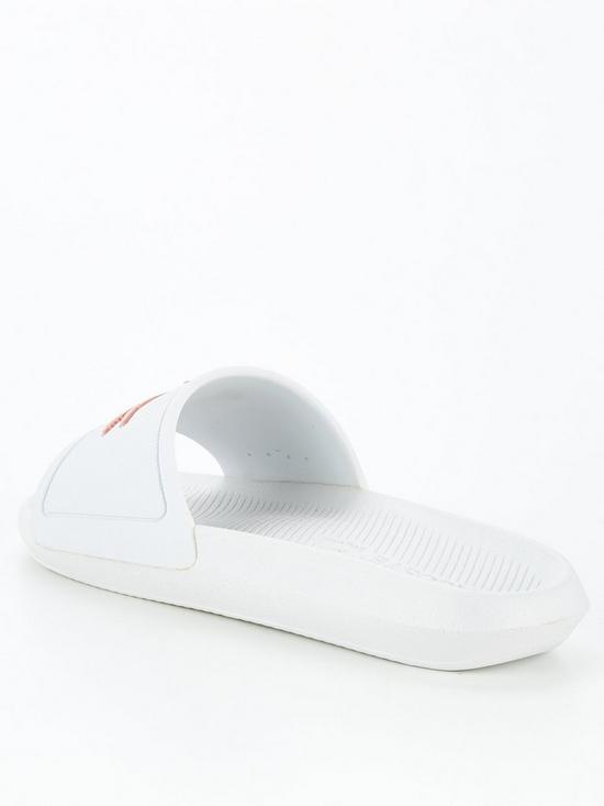 stillFront image of lacoste-croco-slide-logo-flat-sandal-whitepink
