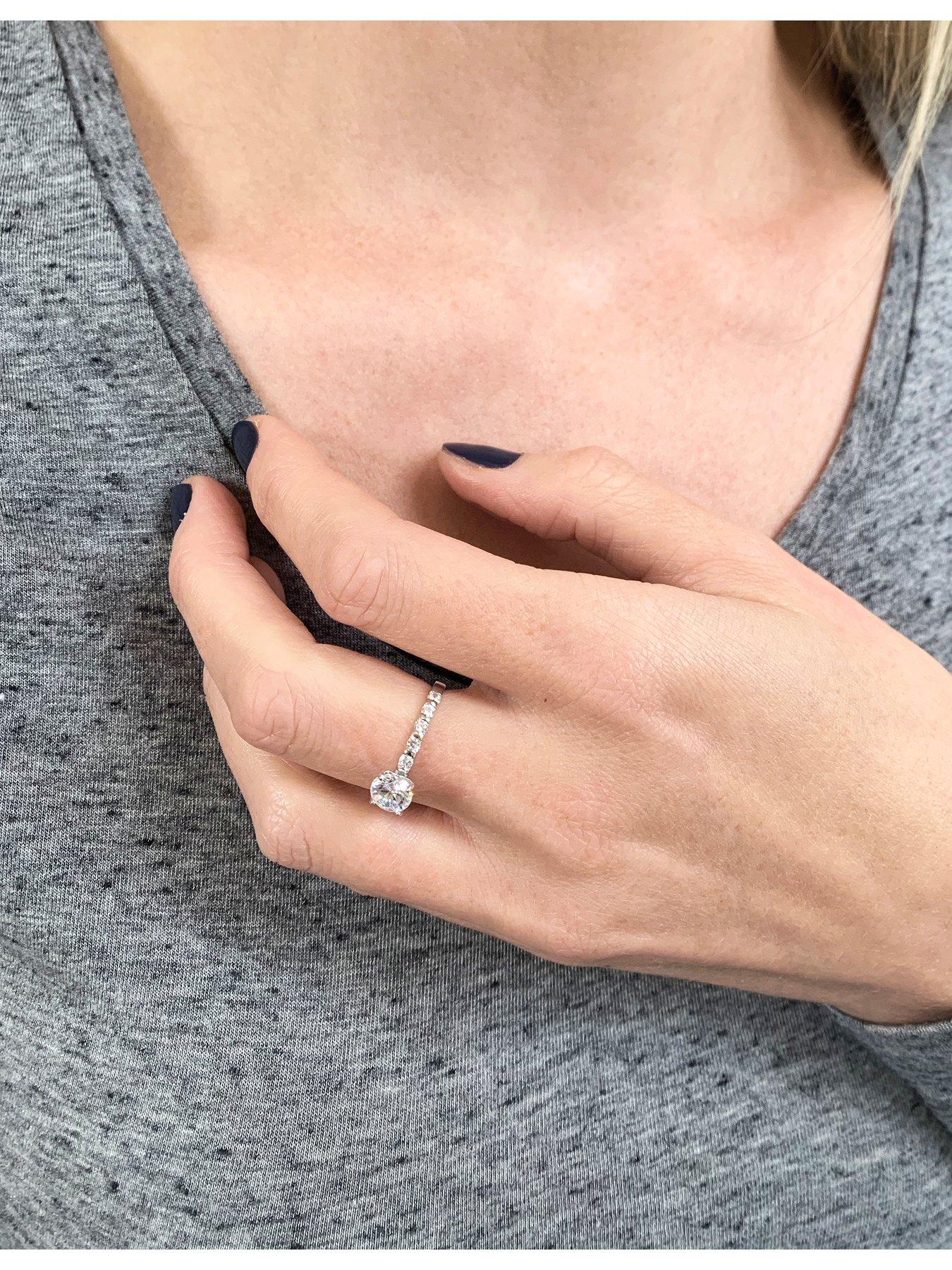 Image 6 of 6 of The Love Collection Sterling Silver Cubic Zirconia Solitaire Ring with Set Shoulders