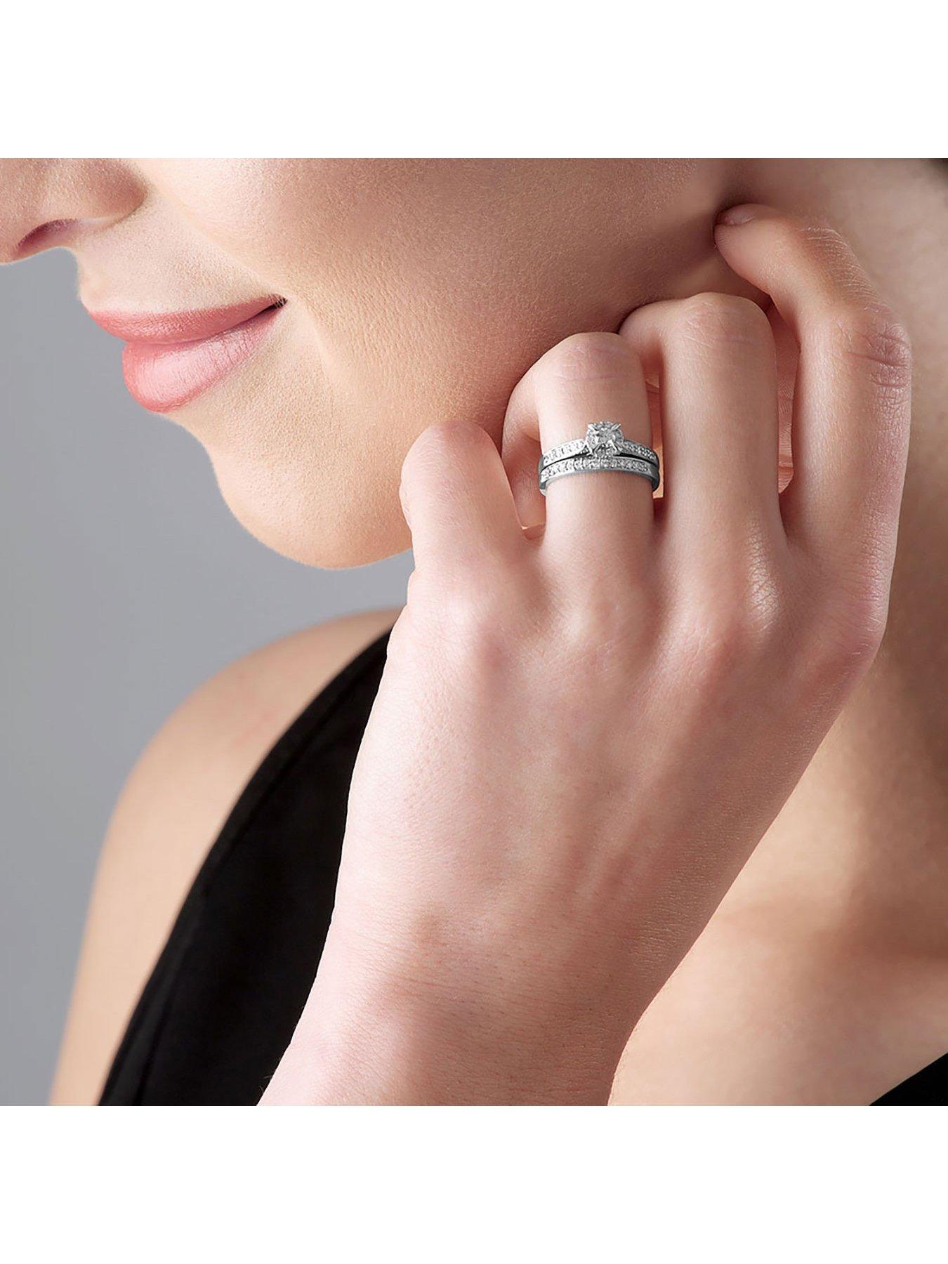 Beaverbrooks 18ct White Gold Diamond Halo Ring Bridal Set