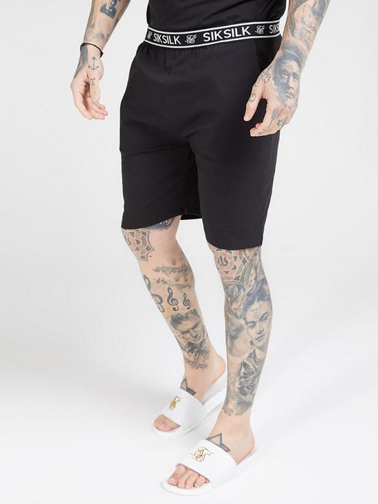 front image of sik-silk-loose-fit-jersey-shorts-blacknbsp