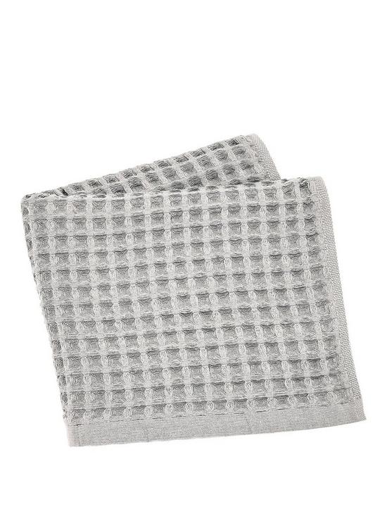 front image of perri-home-waffle-hand-towel-platinum