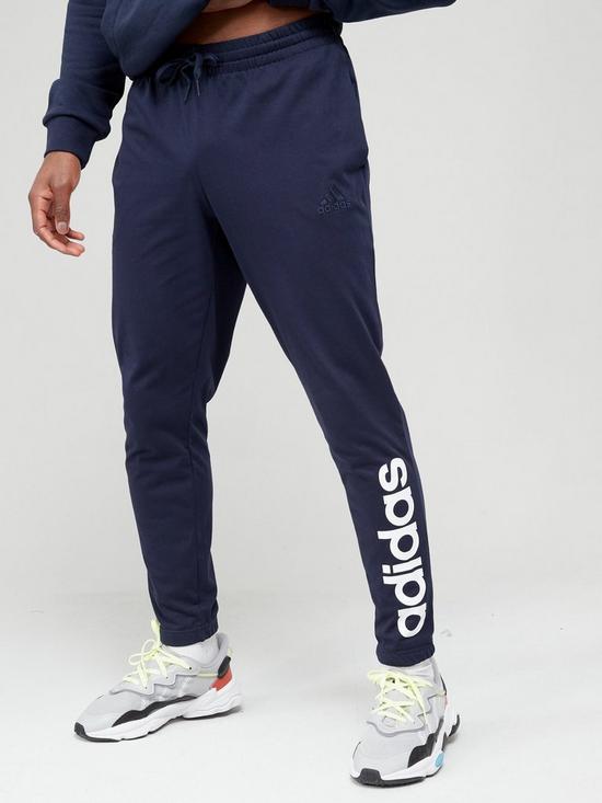 front image of adidas-linear-logo-track-pants-ink