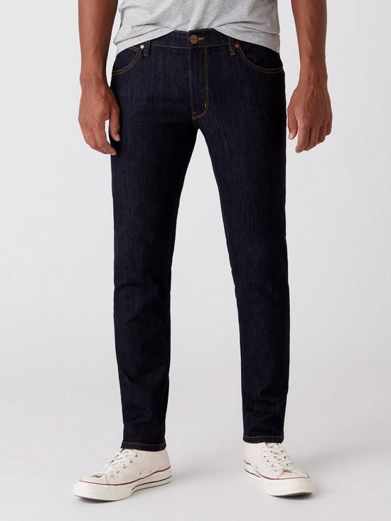 front image of wrangler-larston-slim-taper-jeans-dark-rinse