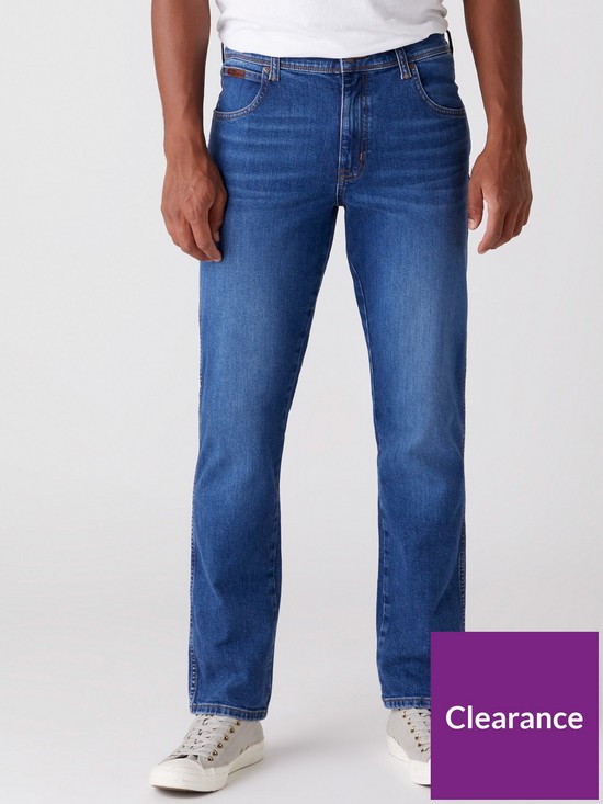 front image of wrangler-texas-authentic-slim-jeans-game-on-blue
