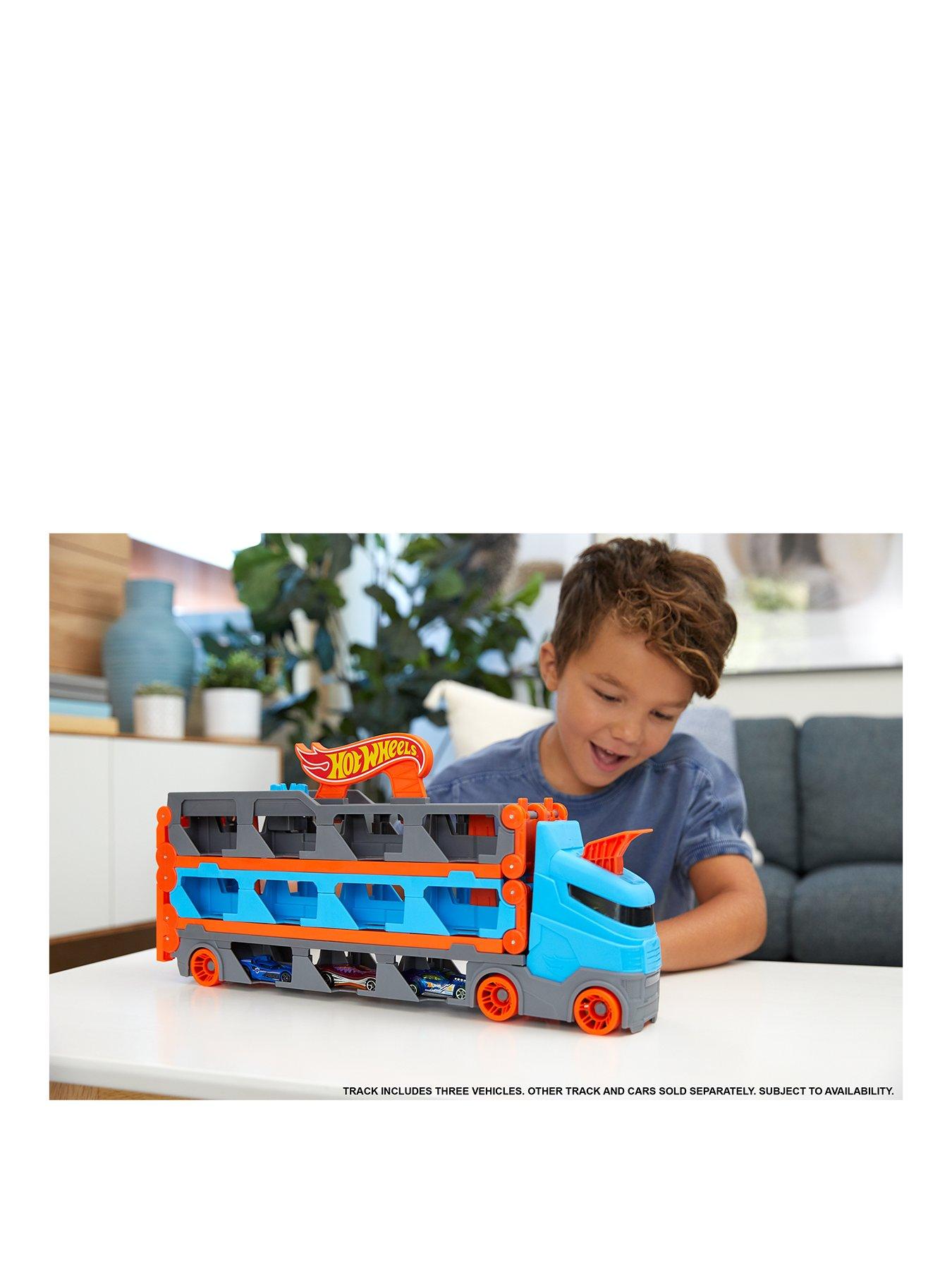  image of hot-wheels-speedway-hauler-carrier-with-3-toy-cars