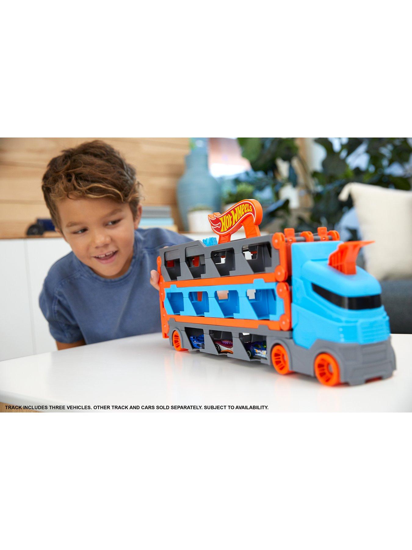  image of hot-wheels-speedway-hauler-carrier-with-3-toy-cars