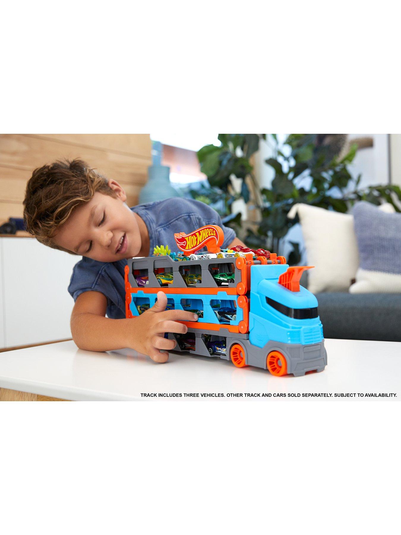  image of hot-wheels-speedway-hauler-carrier-with-3-toy-cars