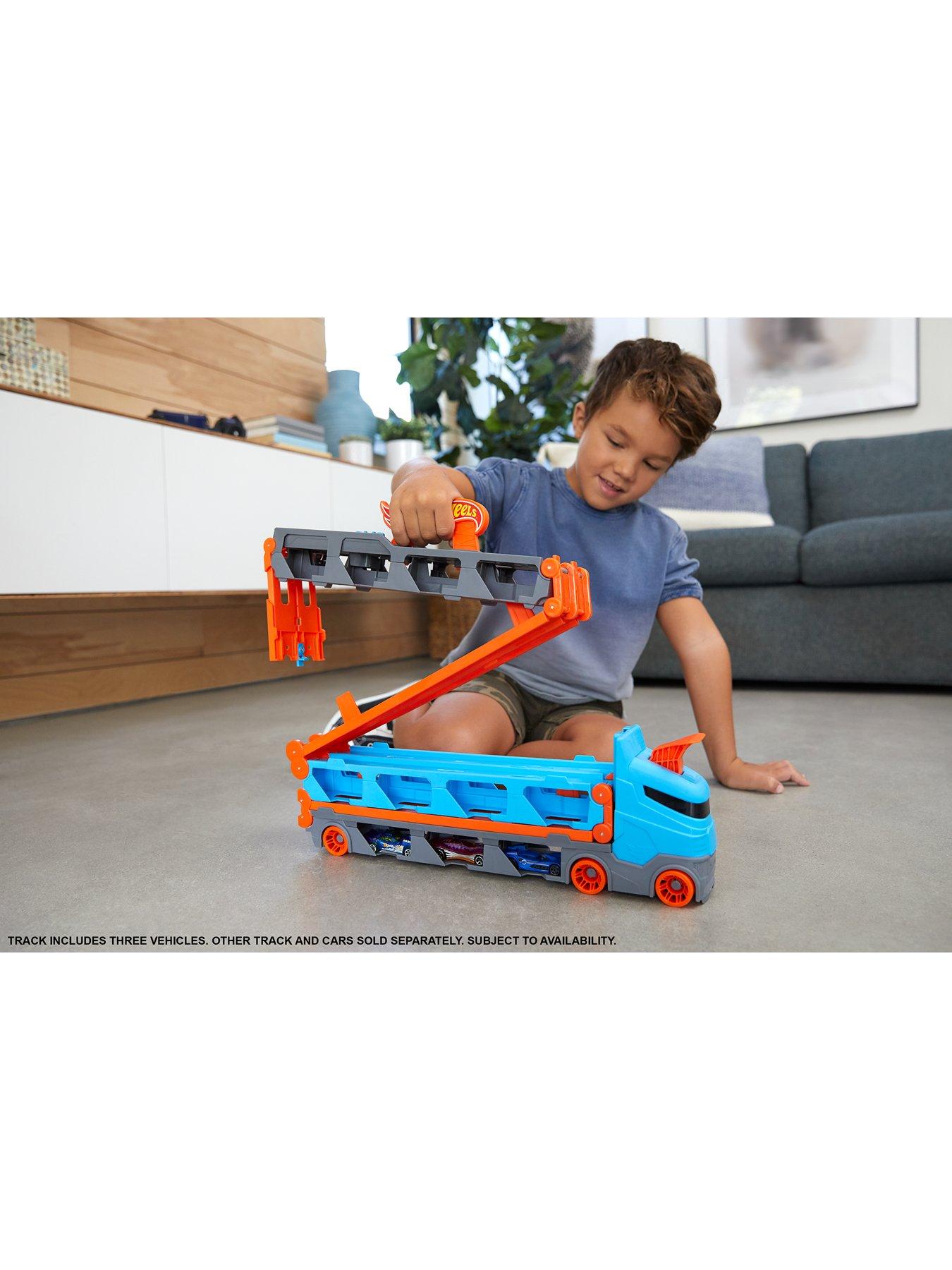  image of hot-wheels-speedway-hauler-carrier-with-3-toy-cars