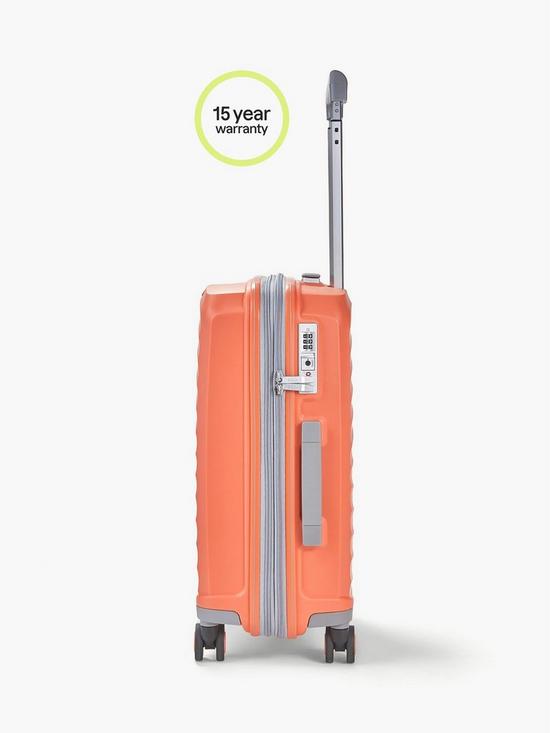 back image of rock-luggage-sunwave-carry-on-8-wheel-suitcase-peach
