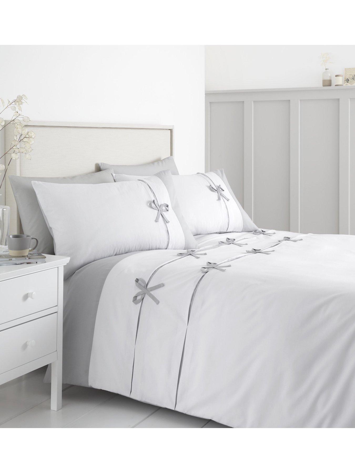  image of catherine-lansfield-milo-bow-single-duvet-covernbspset-white