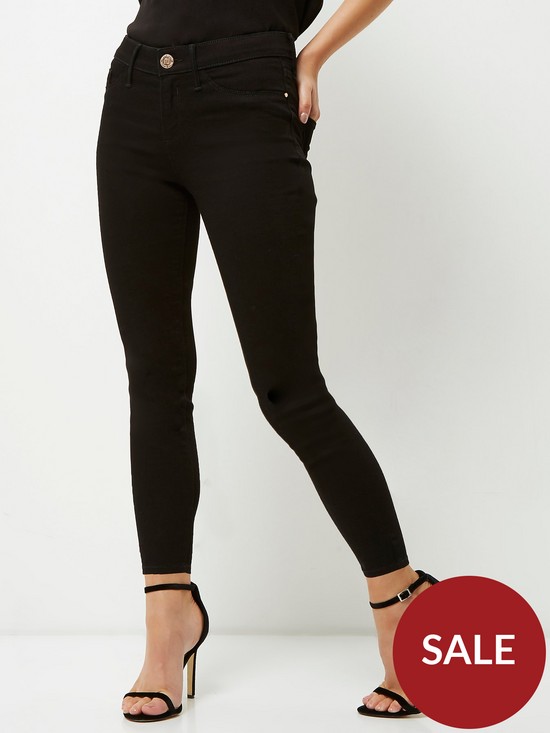 front image of ri-petite-mid-rise-molly-jegging-black