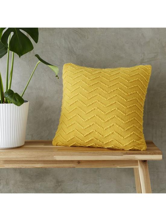 stillFront image of catherine-lansfield-chevron-knit-filled-cushion-43x43