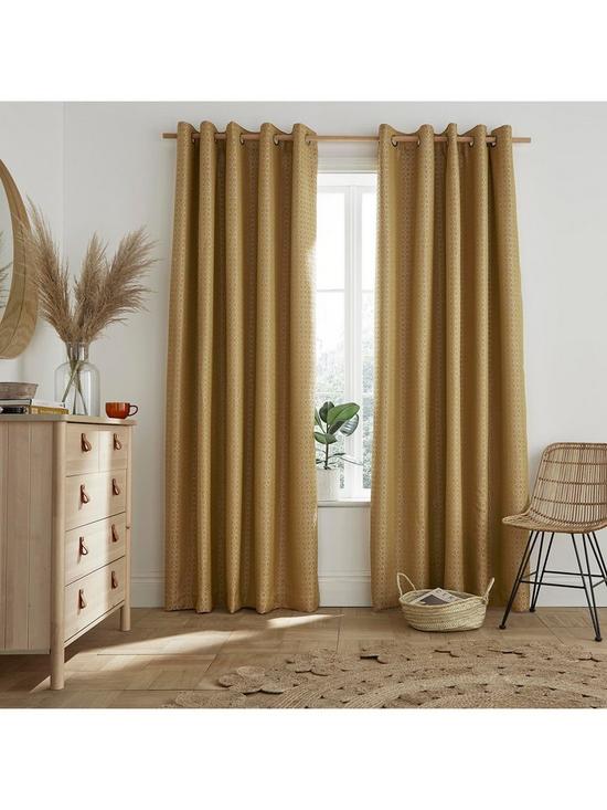 detail image of ashley-wilde-flynn-blackout-lined-eyelet-curtains