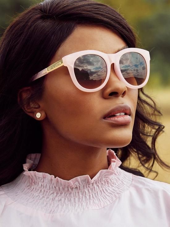 front image of katie-loxton-round-sunglasses-pink