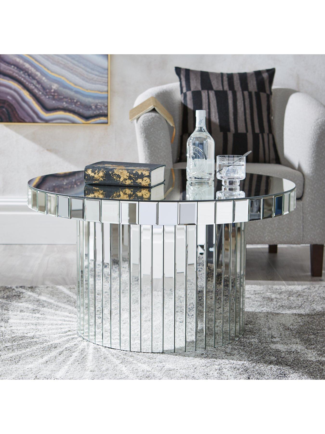 Mirrored circle outlet coffee table