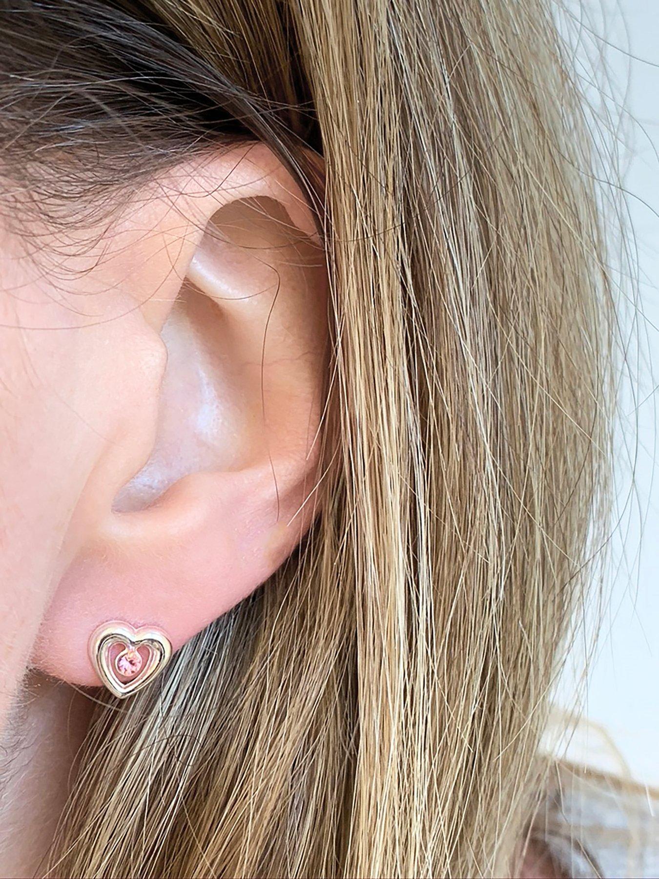 image of the-love-collection-sterling-silver-set-of-two-pink-crystal-butterfly-and-heart-studs