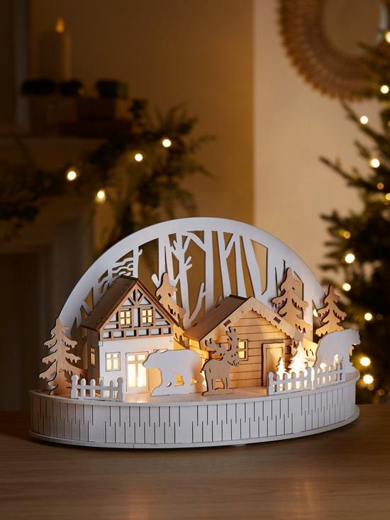 front image of nordic-wooden-village-scene-christmas-decoration