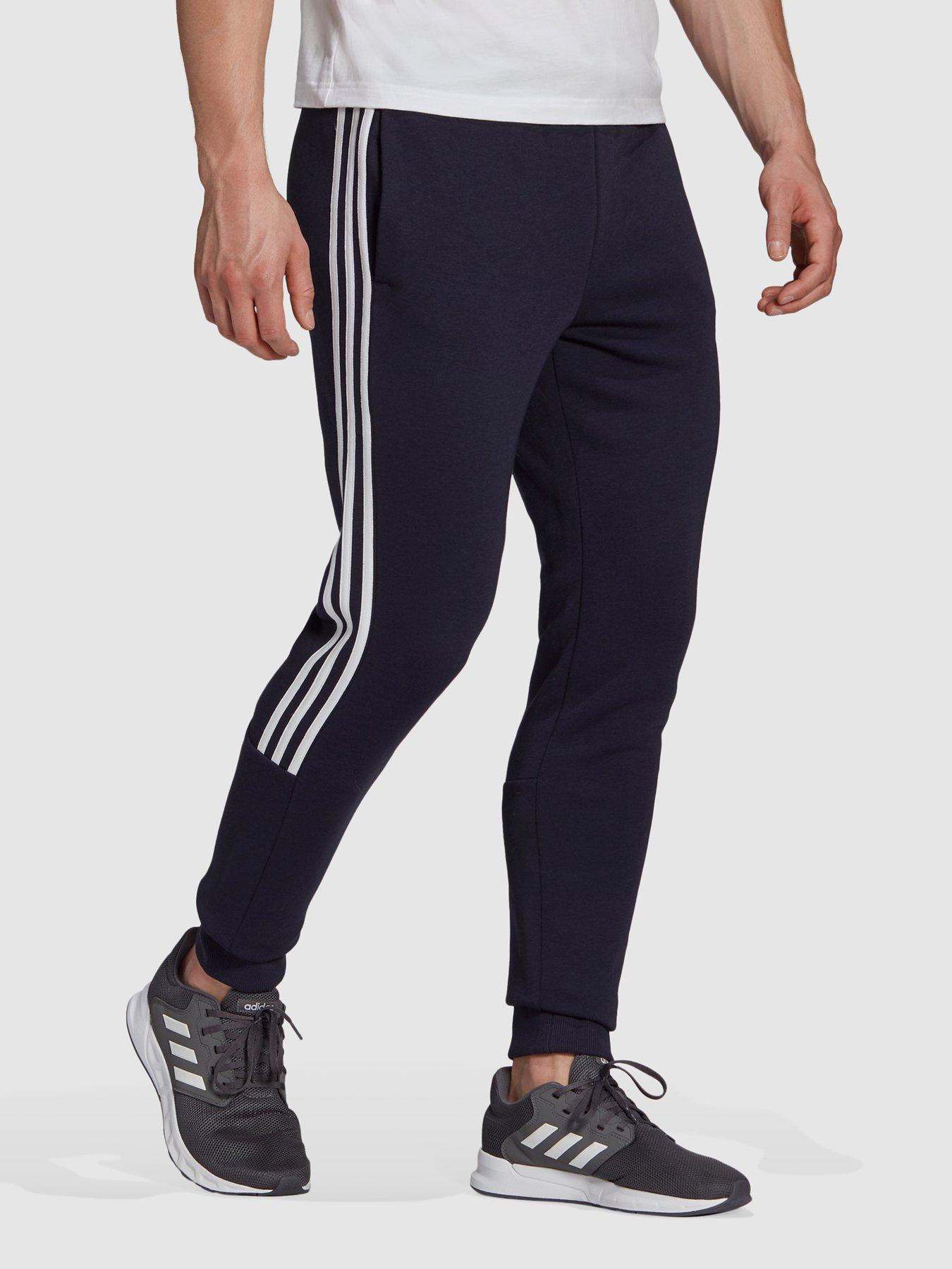 Adidas pants with white stripe store on back