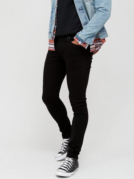 front image of levis-519-skinny-taper-jeans-black
