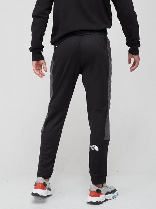 stillFront image of the-north-face-mountain-athletics-cuffed-joggers-black