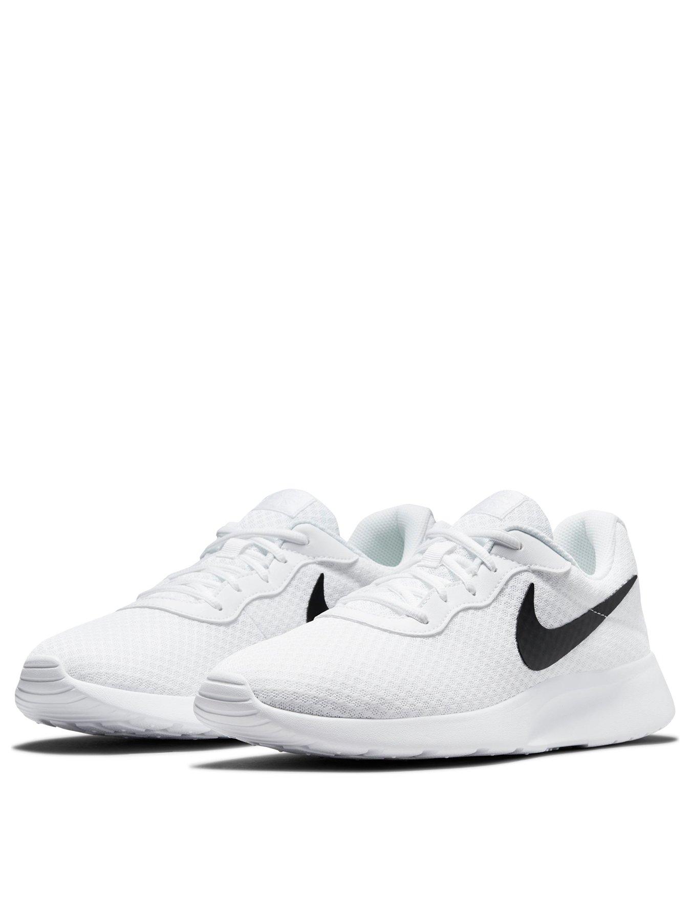 Nike black outlet tanjun trainers