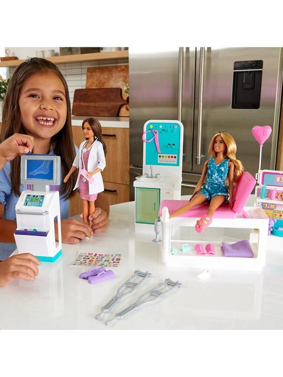 front image of barbie-fast-cast-clinic-playset-with-barbie-doctor-doll