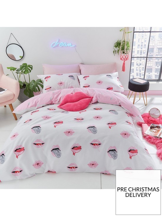 front image of sassy-b-service-reversible-duvet-cover-set-in-pink-and-white