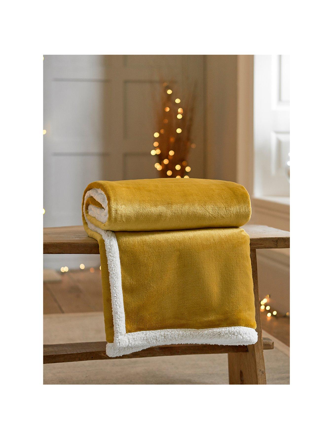yellow throws and cushions