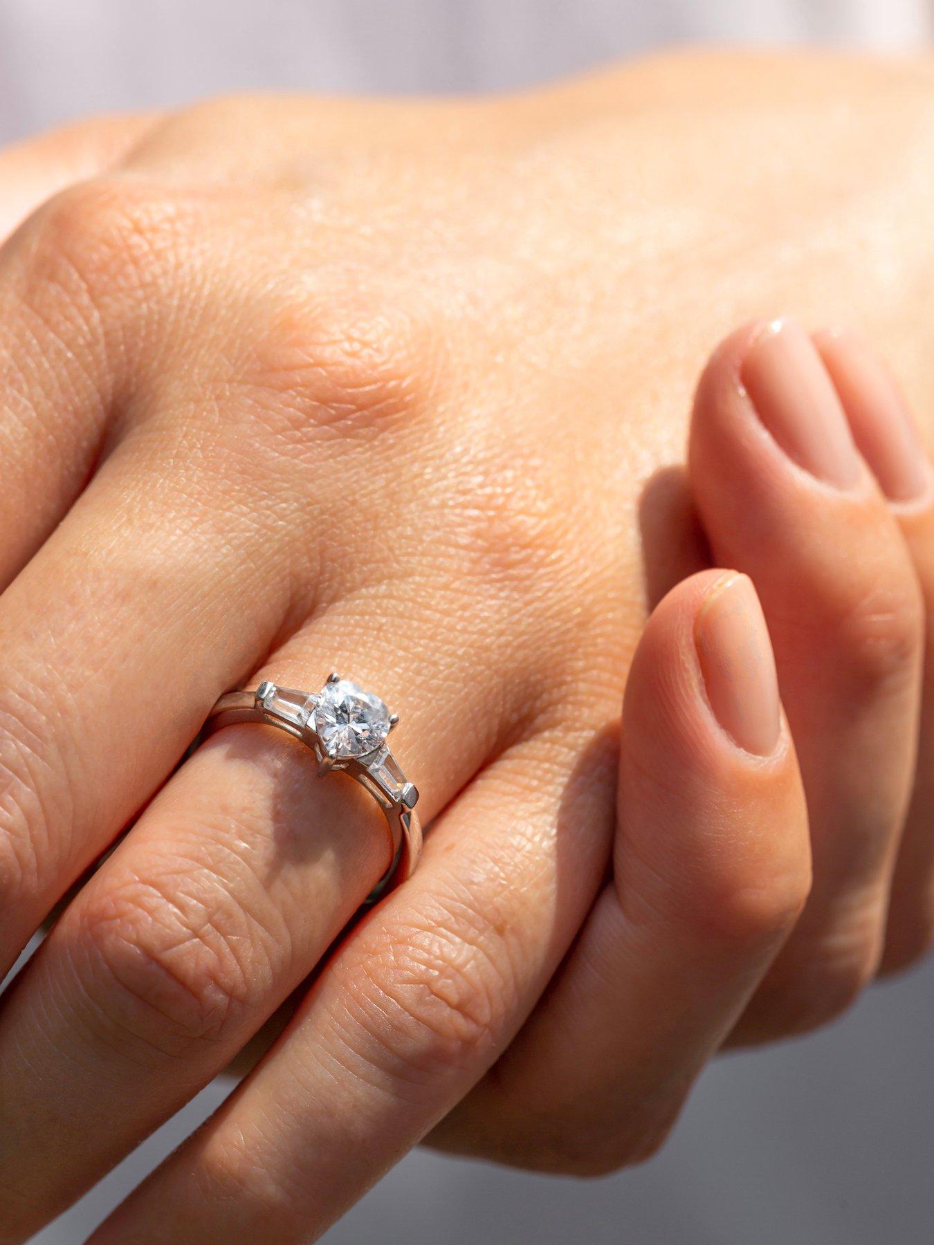  image of the-love-collection-9ct-white-gold-cubic-zirconia-heart-i-love-u-shoulder-ring