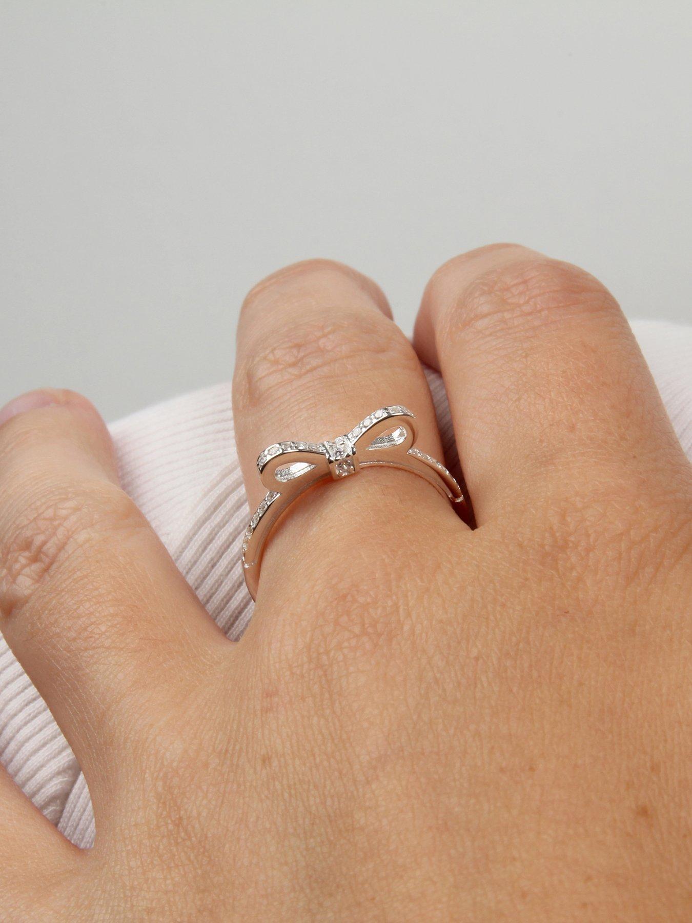 Image 2 of 7 of The Love Collection Sterling Silver & Cubic Zirconia Bow Design Ring