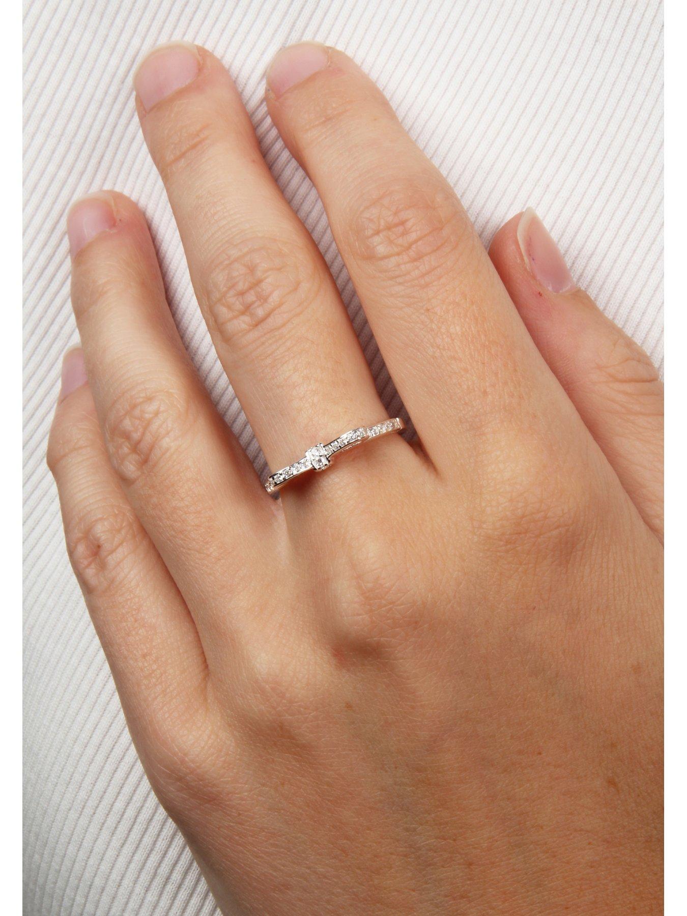 Image 4 of 7 of The Love Collection Sterling Silver & Cubic Zirconia Bow Design Ring