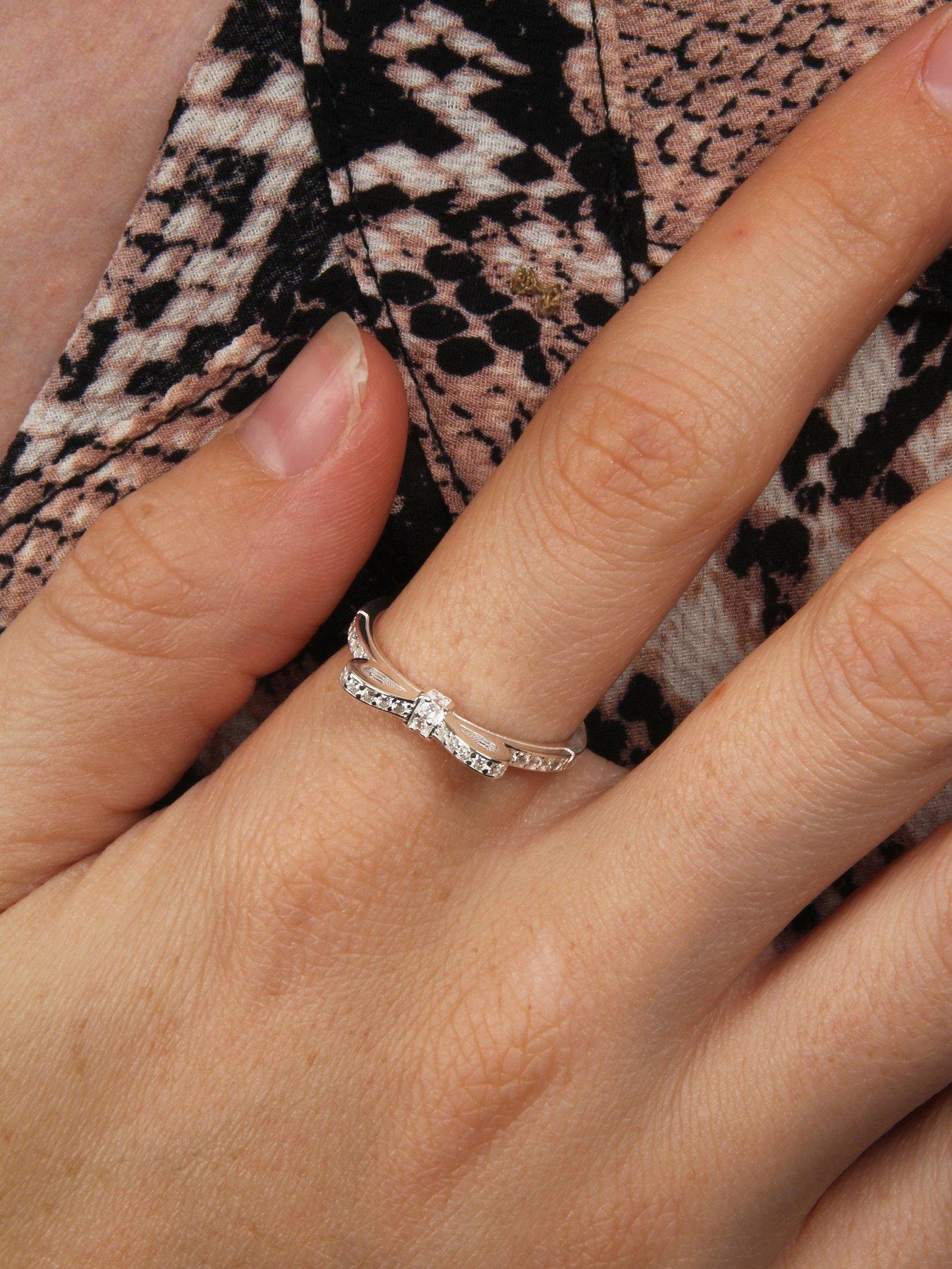 Image 6 of 7 of The Love Collection Sterling Silver & Cubic Zirconia Bow Design Ring