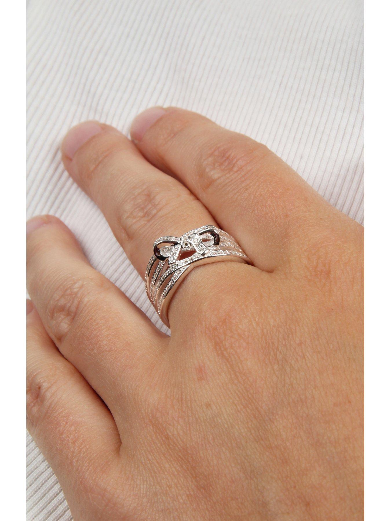 Image 2 of 7 of The Love Collection Sterling Silver Multi Row Cubic Zirconia Bow Ring
