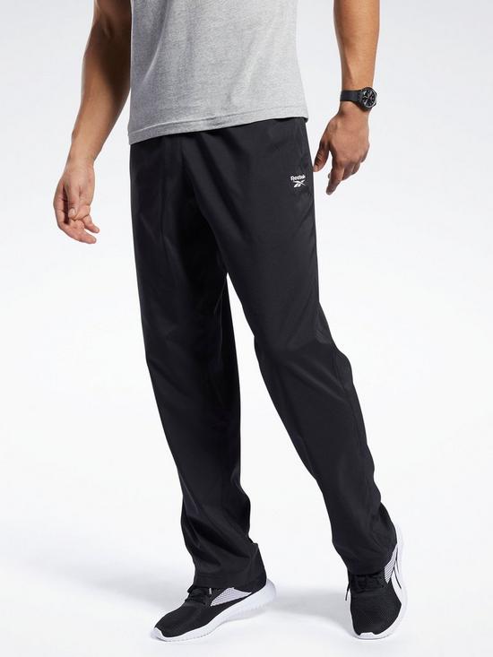 front image of reebok-training-essentials-woven-unlined-pants