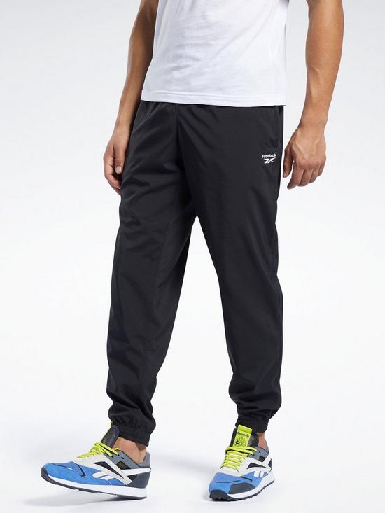 front image of reebok-training-essentials-woven-cuffed-pants
